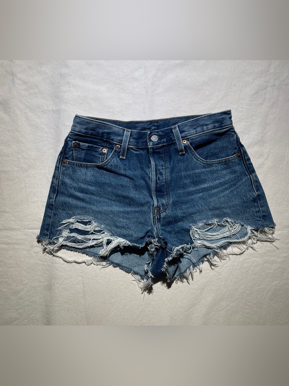 Levi’s 501 cutoffs daisy dukes Size 29 Jean shorts raw hem